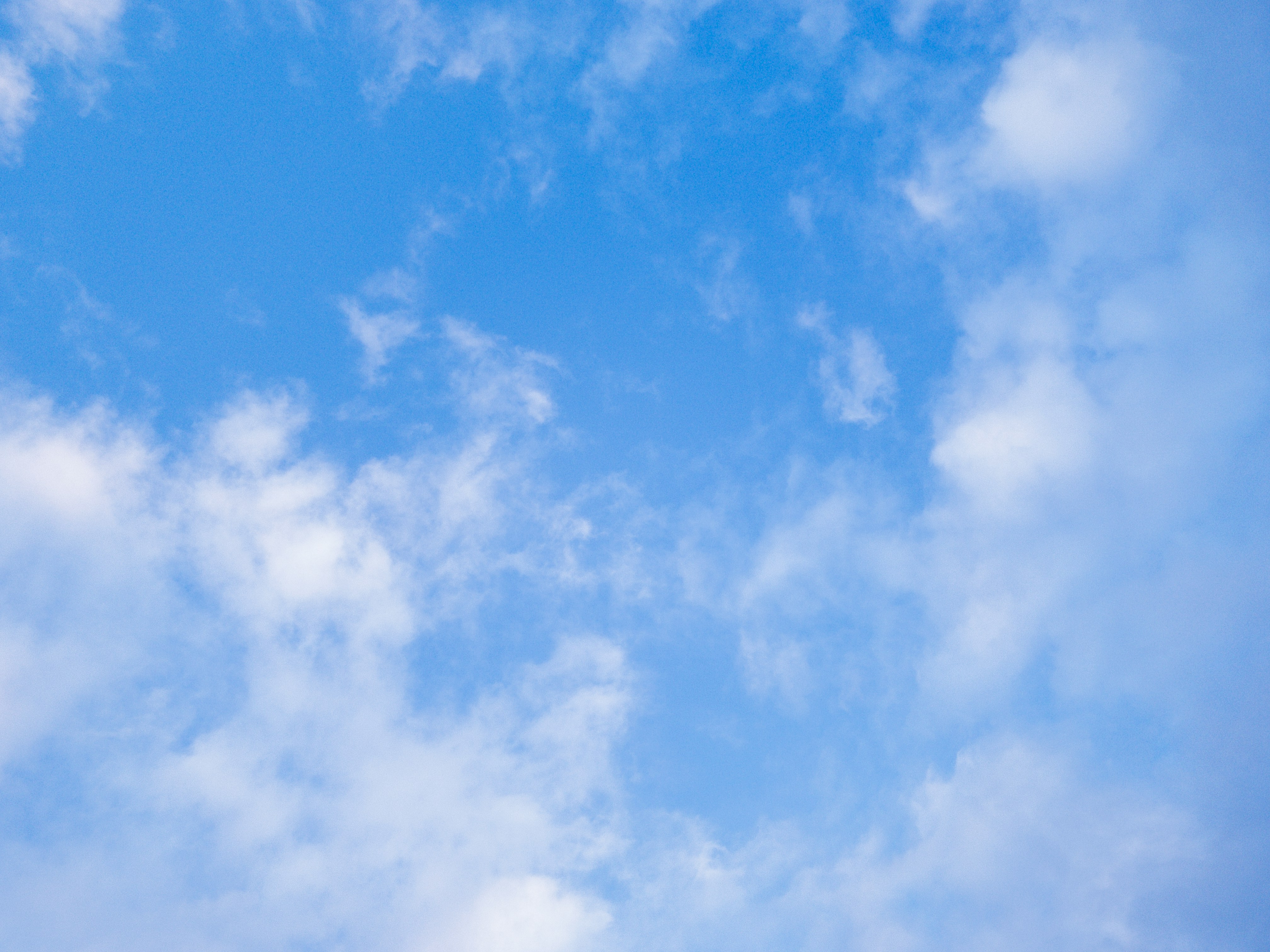 Clear blue sky representing freedom from digital distractions